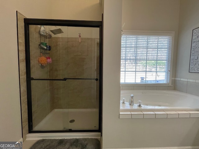 bathroom with an enclosed shower