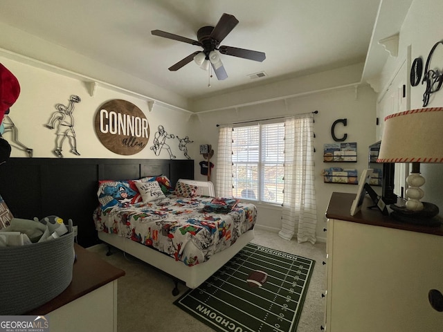 carpeted bedroom with ceiling fan