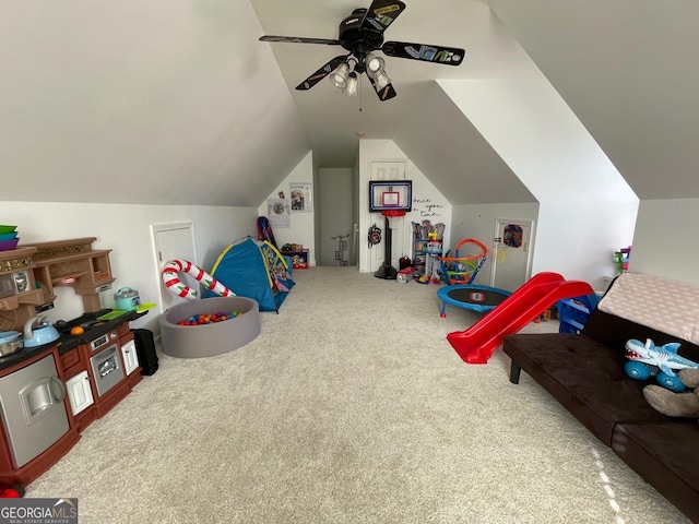 game room with ceiling fan, lofted ceiling, and carpet flooring