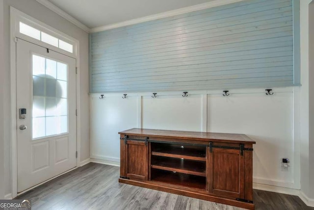 mudroom featuring light hardwood / wood-style flooring and ornamental molding