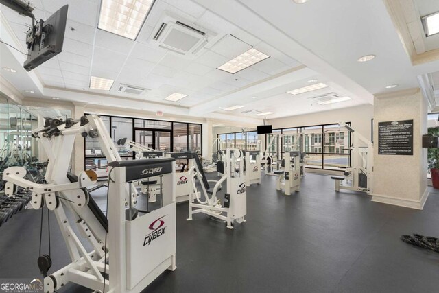 workout area with a drop ceiling