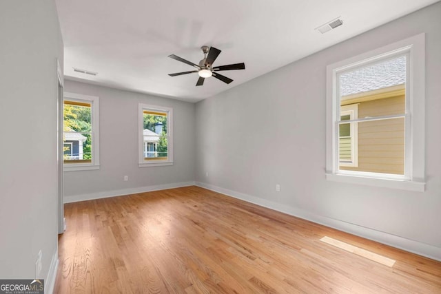 unfurnished room featuring ceiling fan and light hardwood / wood-style floors