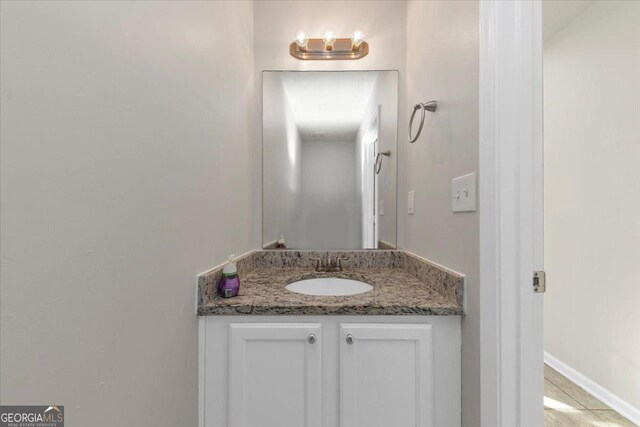 bathroom featuring vanity and tile patterned floors
