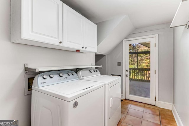 laundry room featuring cabinets, light tile patterned flooring, and independent washer and dryer