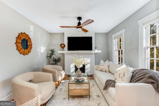 living room featuring ceiling fan