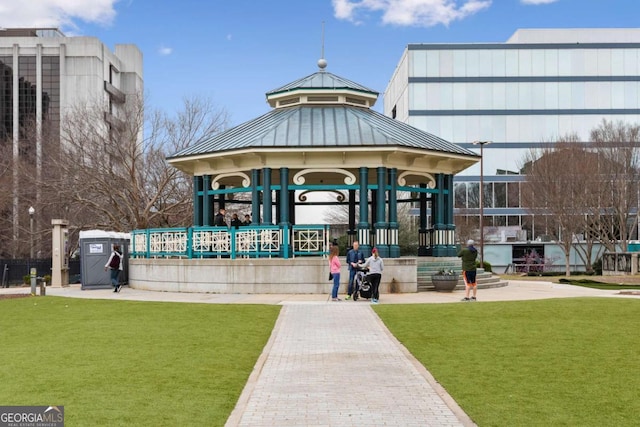 surrounding community featuring a yard and a playground