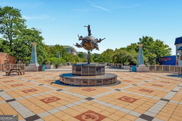 view of community with a patio