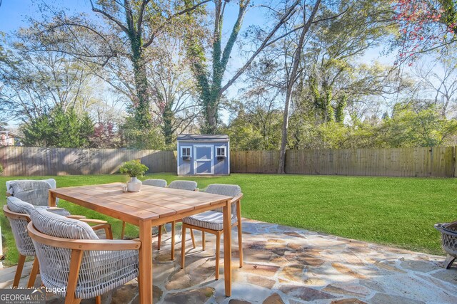 view of patio featuring a storage shed