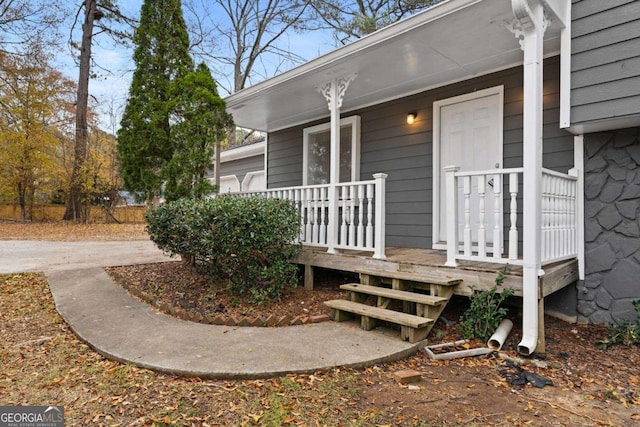 entrance to property with covered porch