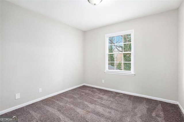 empty room featuring carpet floors