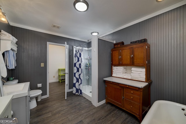 bathroom featuring a shower with shower curtain, vanity, wood-type flooring, and toilet