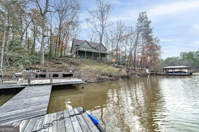 dock area with a water view