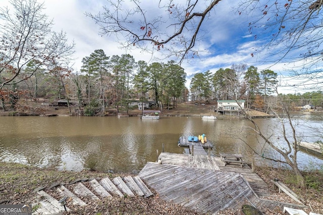 dock area featuring a water view