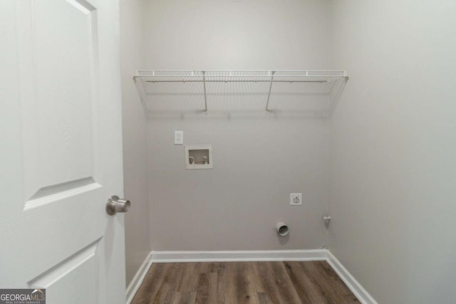 washroom with electric dryer hookup, dark hardwood / wood-style floors, and hookup for a washing machine