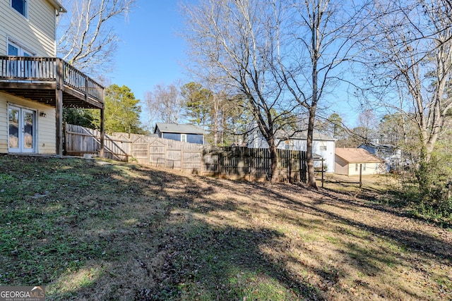 view of yard with a deck