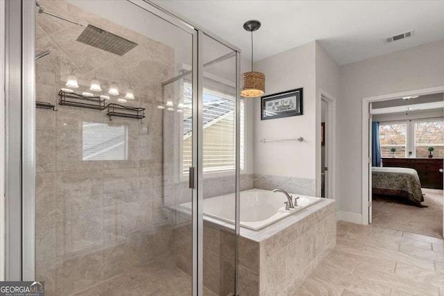 bathroom featuring tile patterned flooring and plus walk in shower