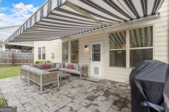 view of patio with a grill and an outdoor hangout area