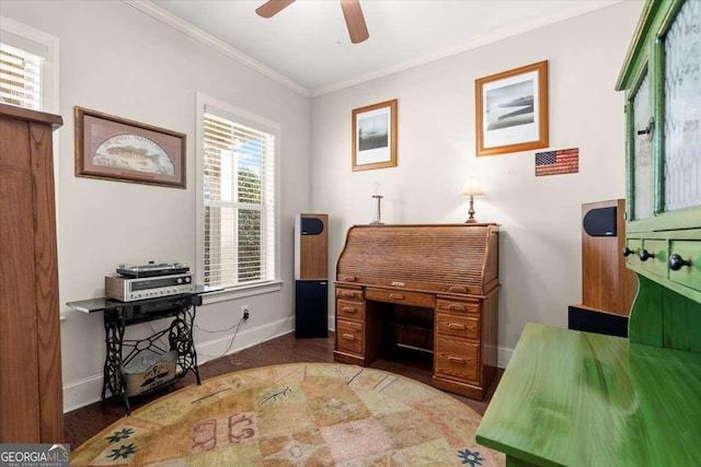 office with crown molding, ceiling fan, and dark wood-type flooring