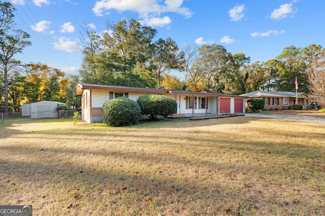 ranch-style house with a front lawn and a porch