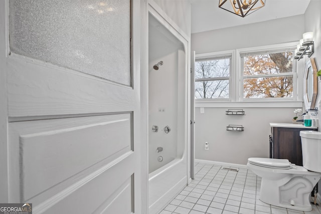 full bathroom featuring tile patterned floors, tub / shower combination, vanity, a notable chandelier, and toilet