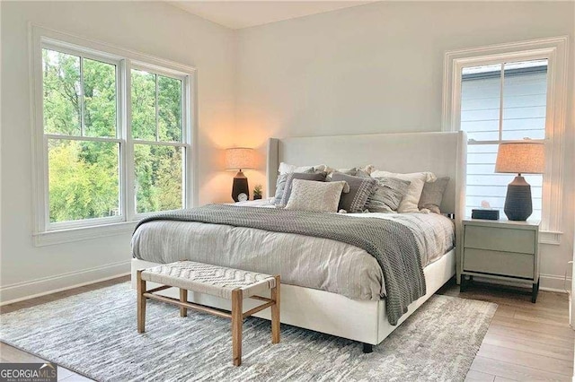 bedroom featuring wood-type flooring