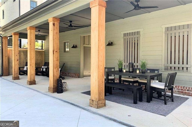 view of patio featuring ceiling fan