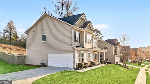 view of property exterior with concrete driveway, a lawn, an attached garage, and fence