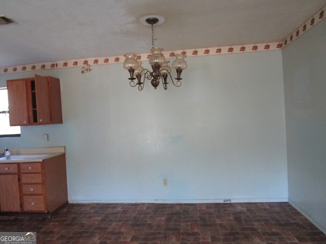 kitchen with a chandelier