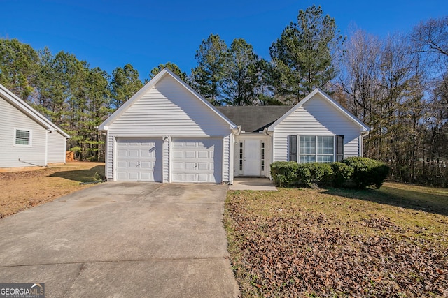 ranch-style home featuring a front yard