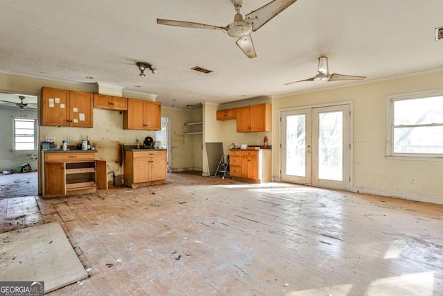 kitchen with french doors and ornamental molding