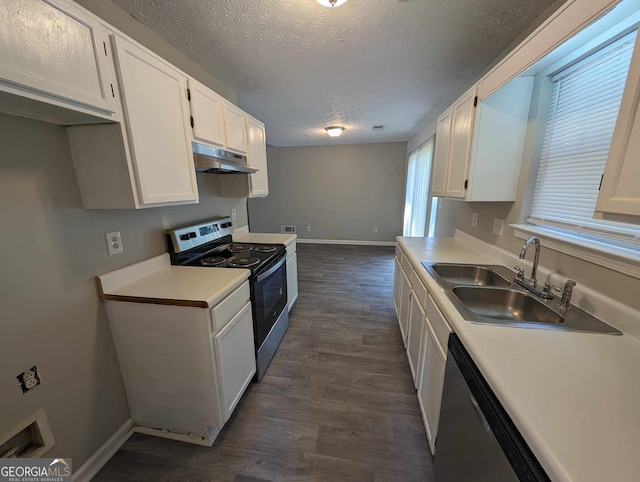 kitchen featuring dark hardwood / wood-style flooring, a textured ceiling, stainless steel appliances, sink, and white cabinets