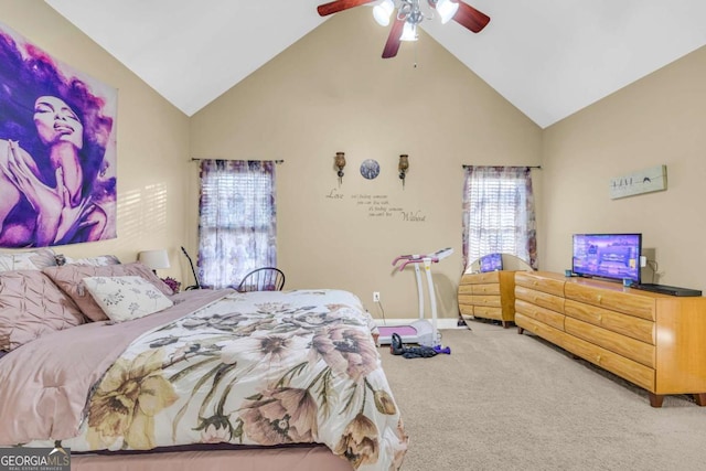 carpeted bedroom featuring high vaulted ceiling and ceiling fan