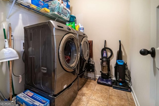 washroom featuring washer and dryer