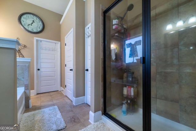 bathroom with plus walk in shower and tile patterned floors