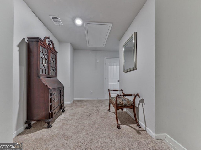 living area with light carpet