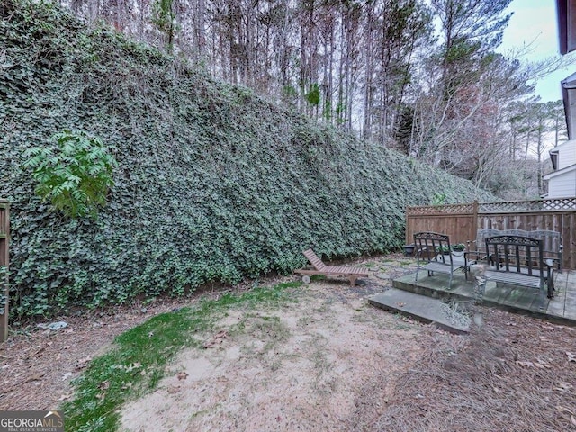 view of yard featuring a wooden deck