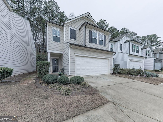 view of front of property featuring a garage