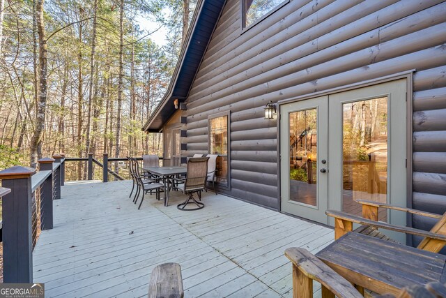 deck with a sunroom