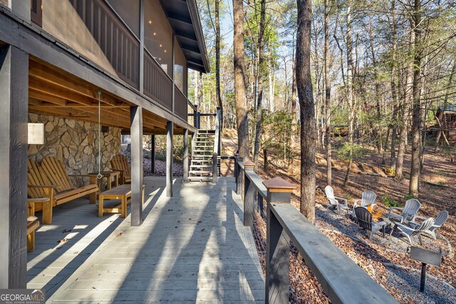 back of house with a deck, central AC unit, and a sunroom