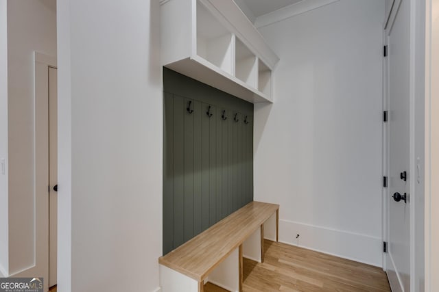 mudroom with light hardwood / wood-style flooring