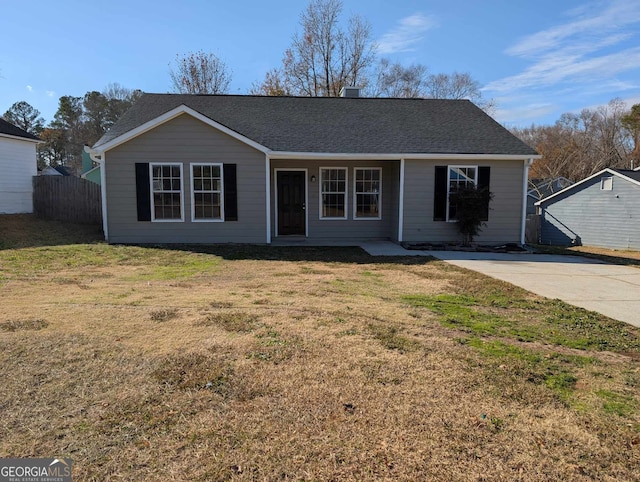 ranch-style house with a front yard