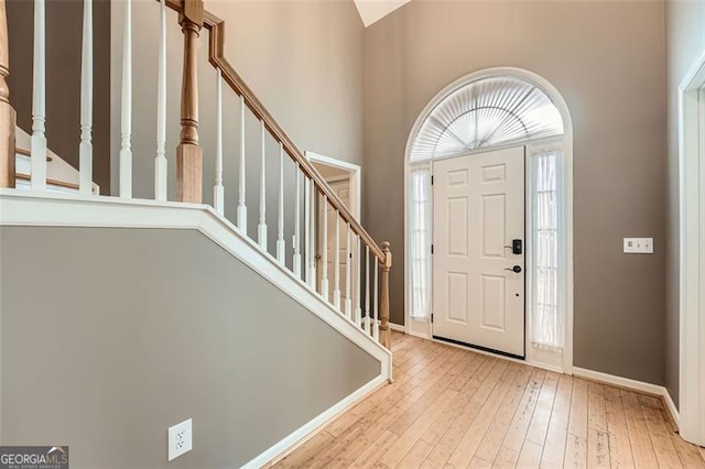 entryway with light hardwood / wood-style flooring