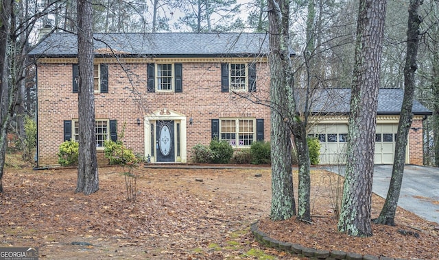 colonial-style house with a garage