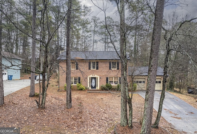 colonial house featuring a garage