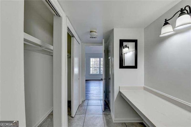 interior space featuring light tile patterned floors