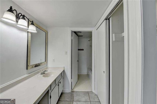 bathroom with vanity and tile patterned floors