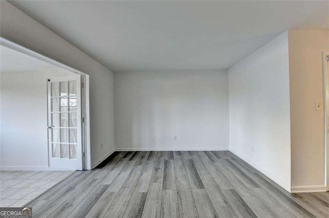 empty room featuring light hardwood / wood-style floors