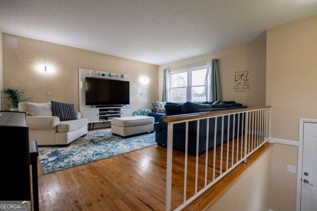 living room with hardwood / wood-style flooring