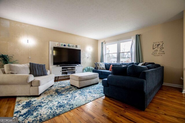 living room with dark hardwood / wood-style floors