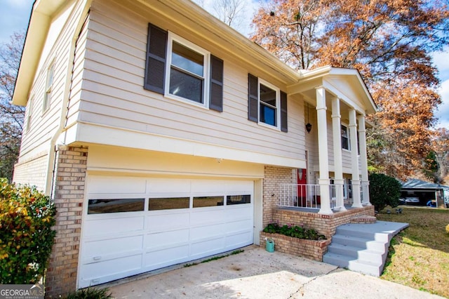 view of front of property with a garage